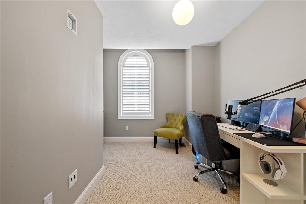 81 Central Tree Road Rutland, MA 01543 - Photo 23 of 31 a view of a workspace with furniture and a window