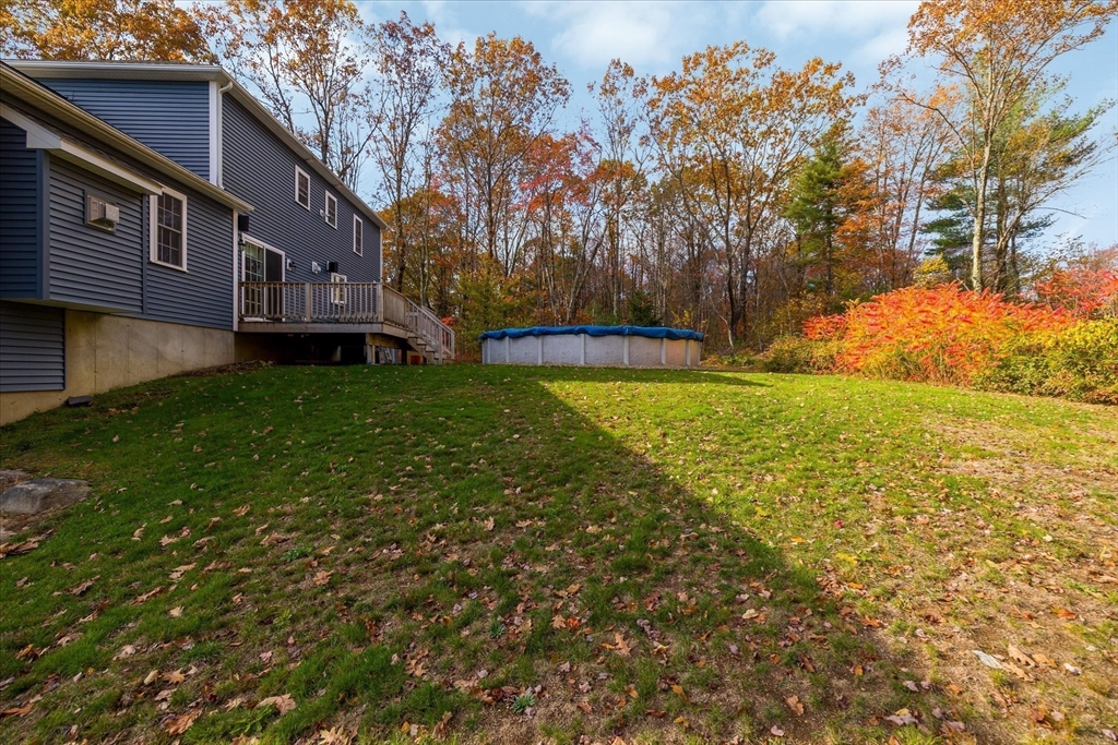 81 Central Tree Road Rutland, MA 01543 - Photo 27 of 31 a view of backyard with large trees