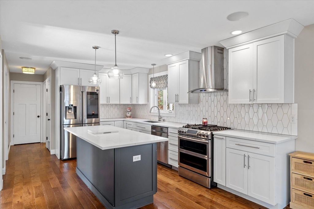 81 Central Tree Road Rutland, MA 01543 - Photo 4 of 31 a kitchen with a sink stove and cabinets