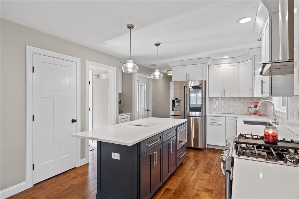 81 Central Tree Road Rutland, MA 01543 - Photo 5 of 31 a kitchen with a sink a stove a refrigerator and cabinets