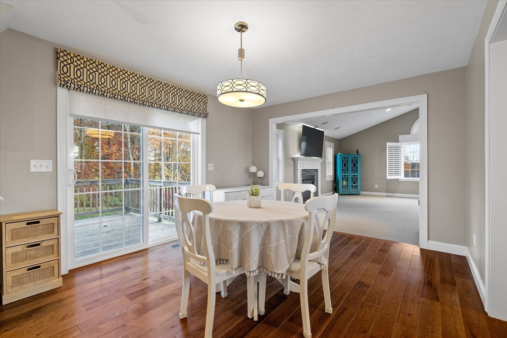 81 Central Tree Road Rutland, MA 01543 - Photo 8 of 31 a view of a dining room with furniture wooden floor and chandelier