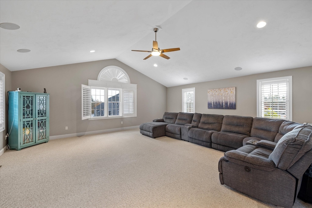 81 Central Tree Road Rutland, MA 01543 - Photo 10 of 31 a living room with furniture ceiling fan and a window