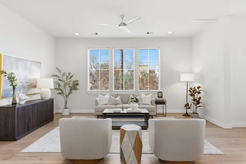 a living room with furniture and window