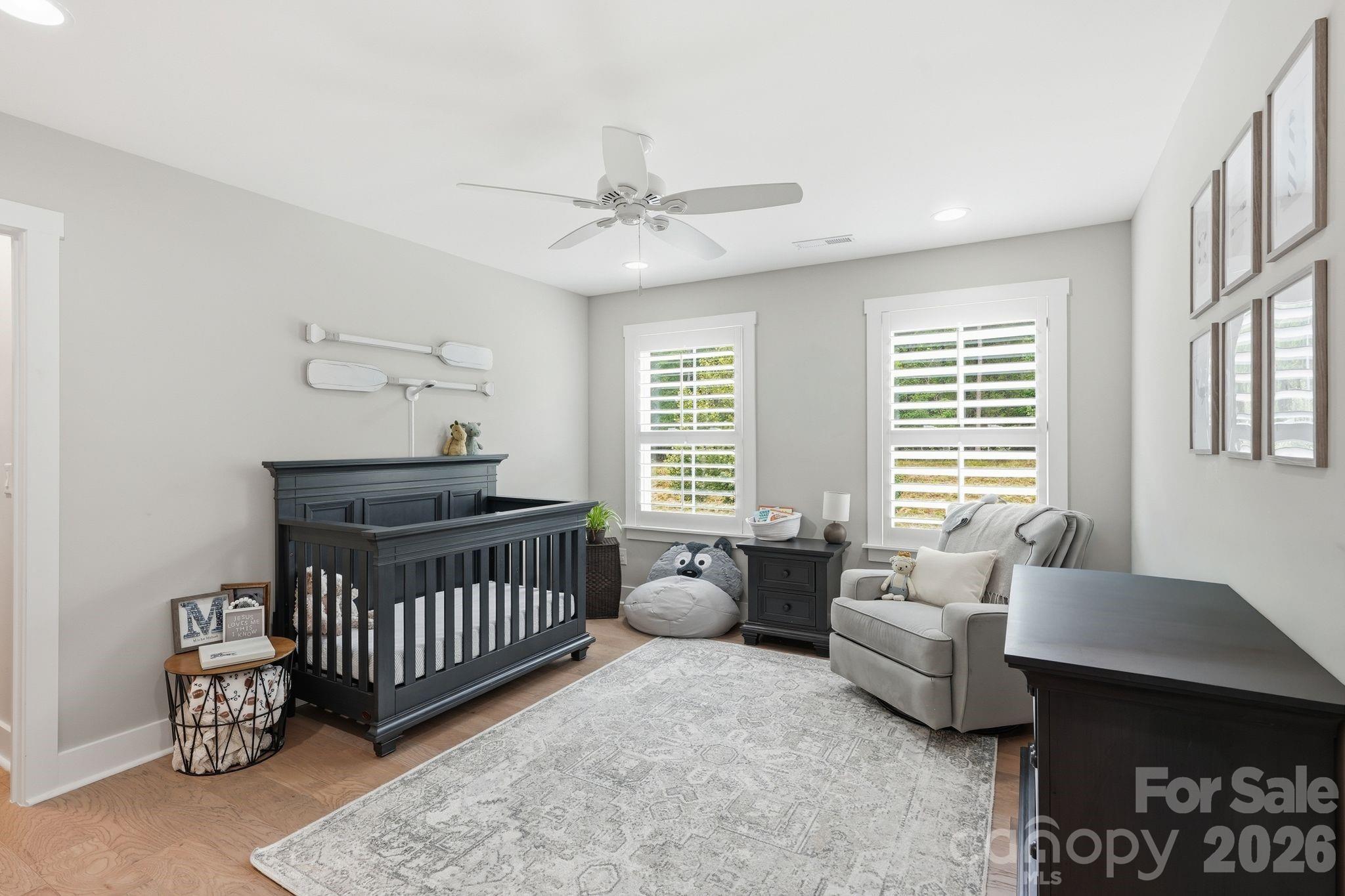 1086 Weir Court Fort Mill, SC 29708 - Photo 27 of 40 a bedroom with furniture and a window