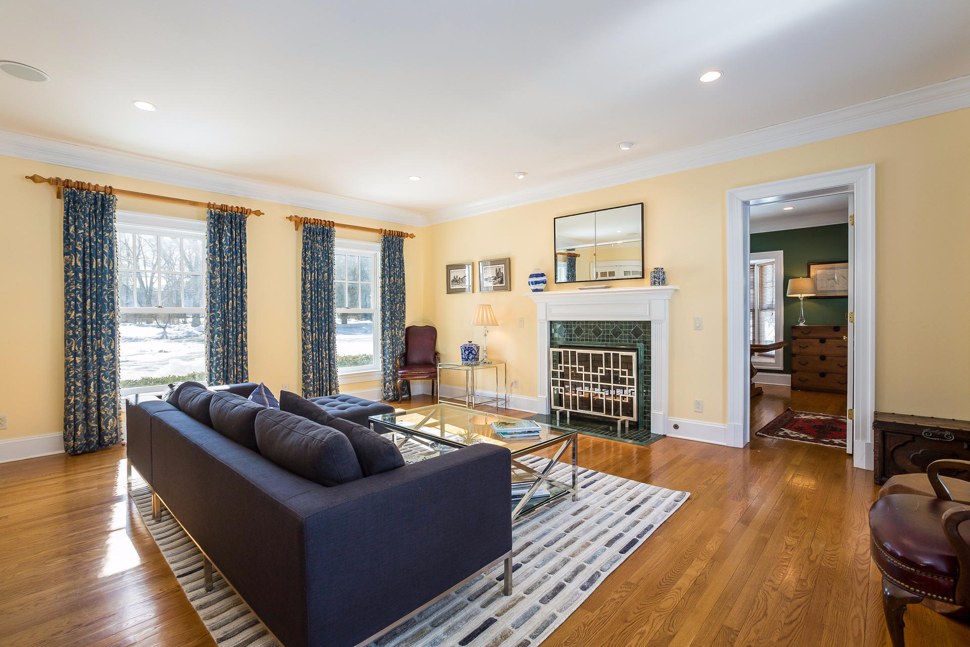 74 Doolittle Road Stamford, CT 06902 - Photo 4 of 28 a living room with furniture and a fireplace