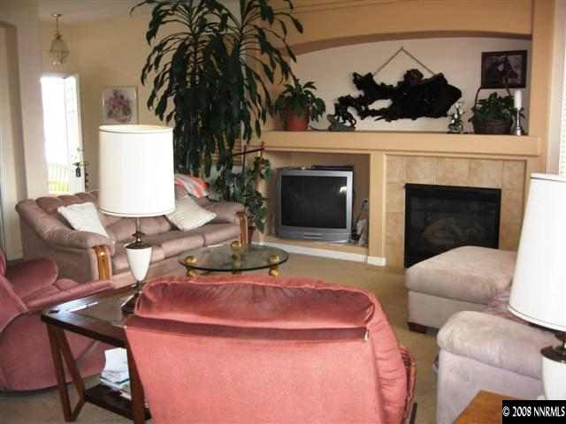 1854 San Pablo Drive Reno, NV 89521 - Photo 5 of 9 a living room with furniture and a fireplace