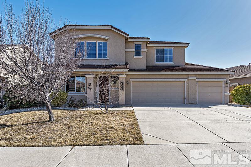 10460 Blockade Drive Reno, NV 89521 - Photo 1 of 25 a front view of a house with yard