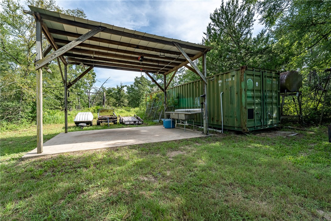 2033 Lcr 704, Unit COUNTYROAD Kosse, TX 76653 - Photo 29 of 31 a view of a bench in the garden