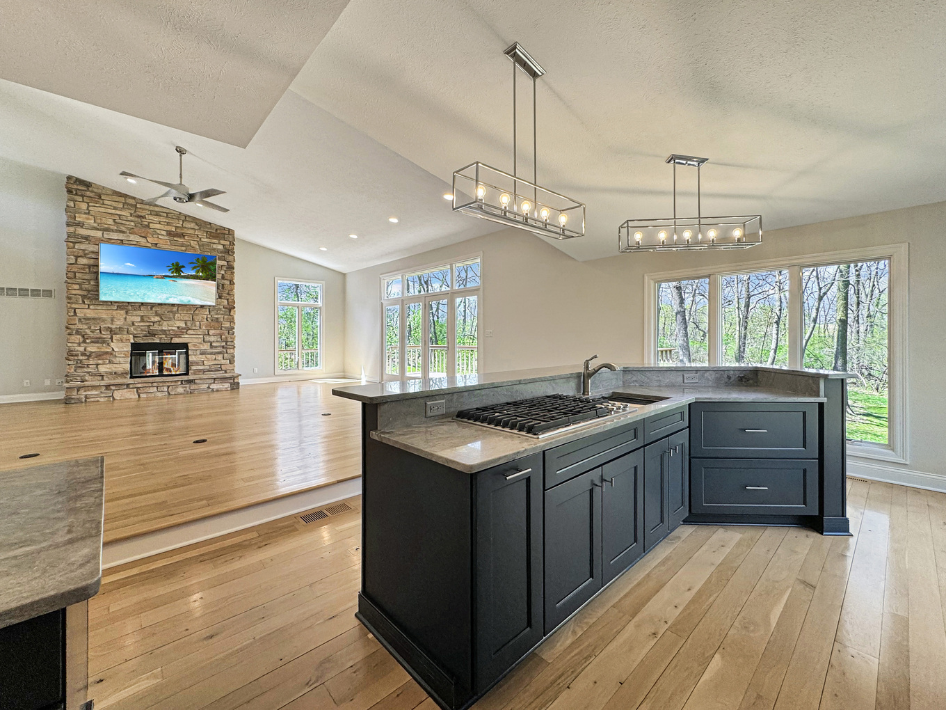 1669 Barberry Circle Freeport, IL 61032 - Photo 13 of 67 a kitchen with stainless steel appliances granite countertop a stove and a wooden floors
