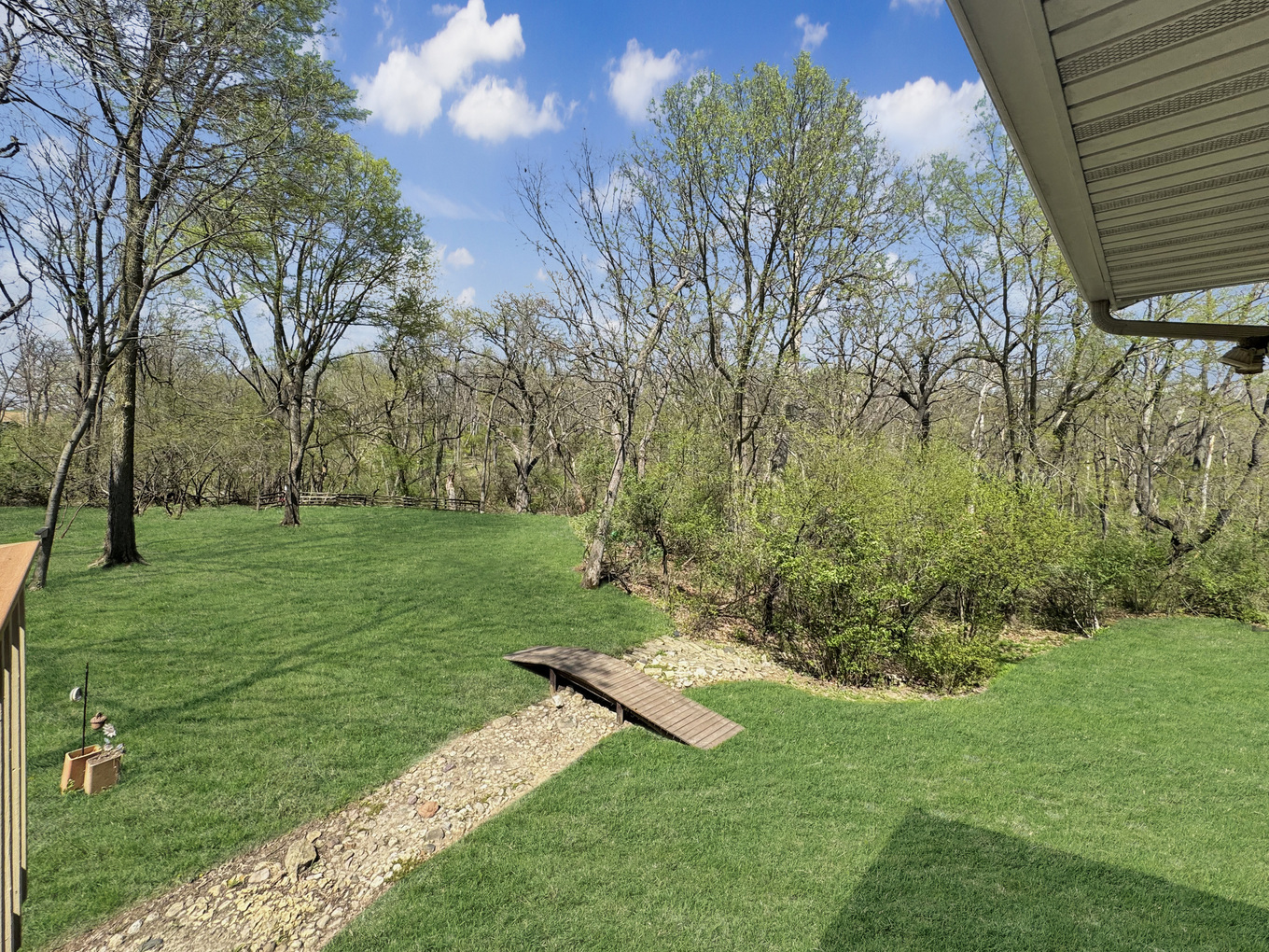 1669 Barberry Circle Freeport, IL 61032 - Photo 26 of 67 a view of a backyard with large trees
