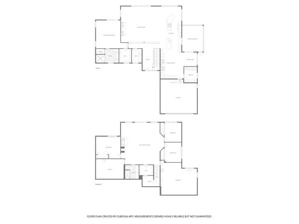 a living room with wooden floors and a couch