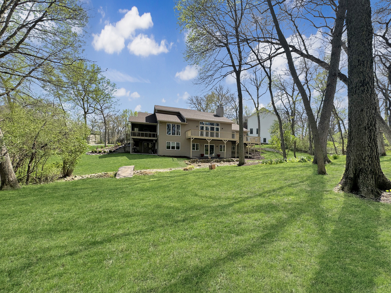 1669 Barberry Circle Freeport, IL 61032 - Photo 48 of 67 a view of a house with a big yard and large trees