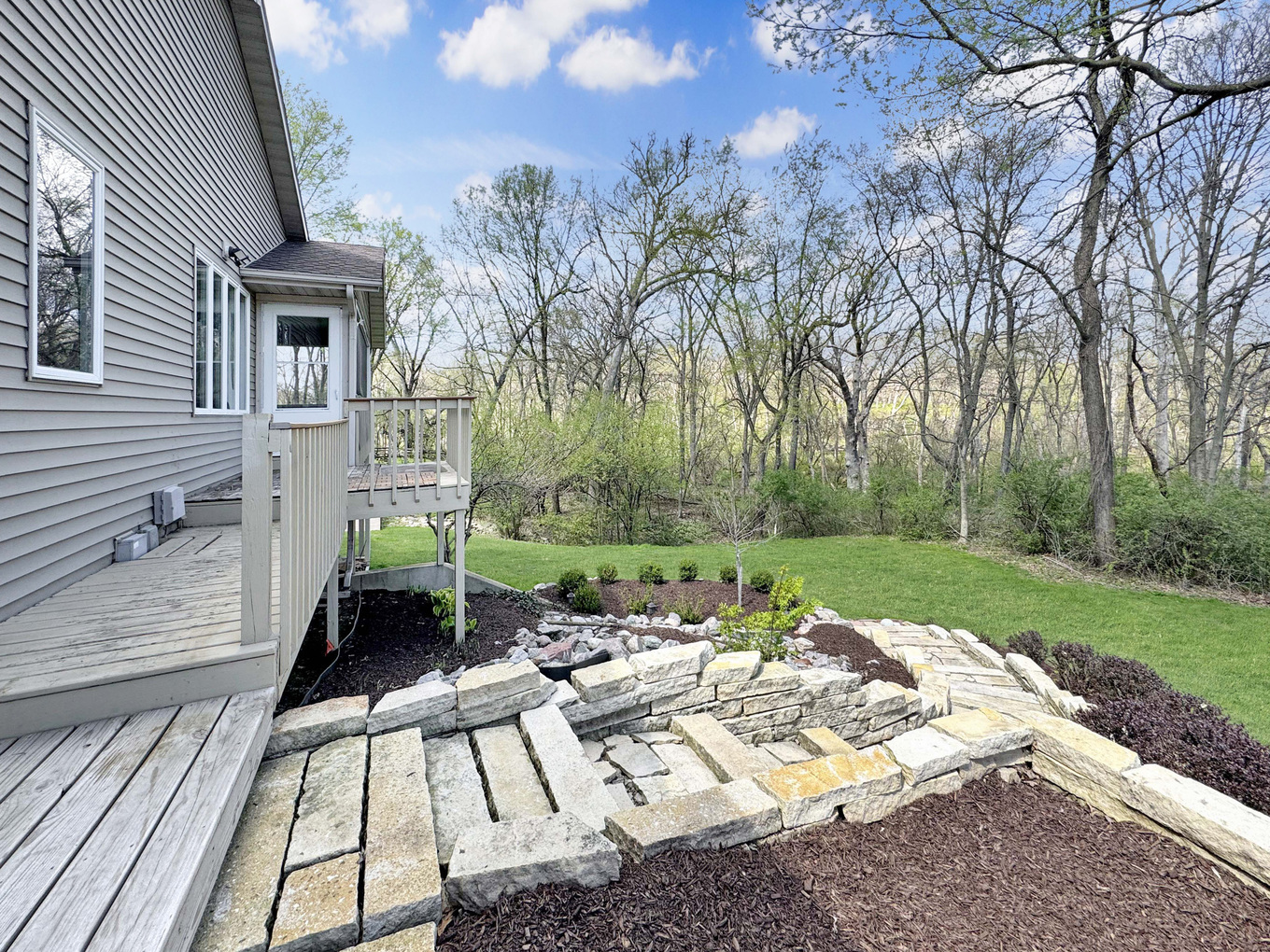 1669 Barberry Circle Freeport, IL 61032 - Photo 51 of 67 a view of a patio with couches chairs and a table and chairs with garden view