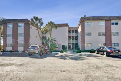 a view of front door and yard