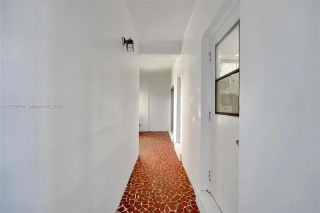 a view of a balcony with wooden floor