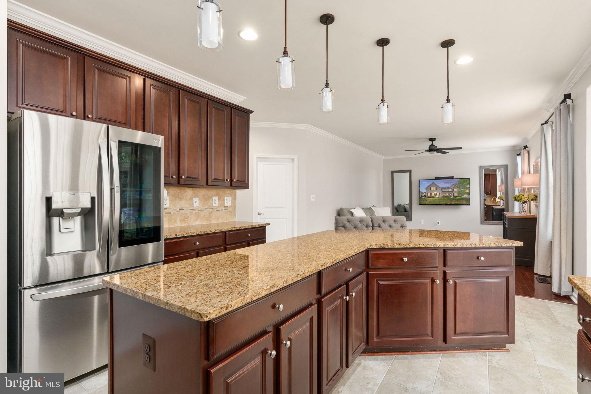 9417 Reservoir Road Fredericksburg, VA 22407 - Photo 22 of 80 Modern kitchen with elegant finishes.