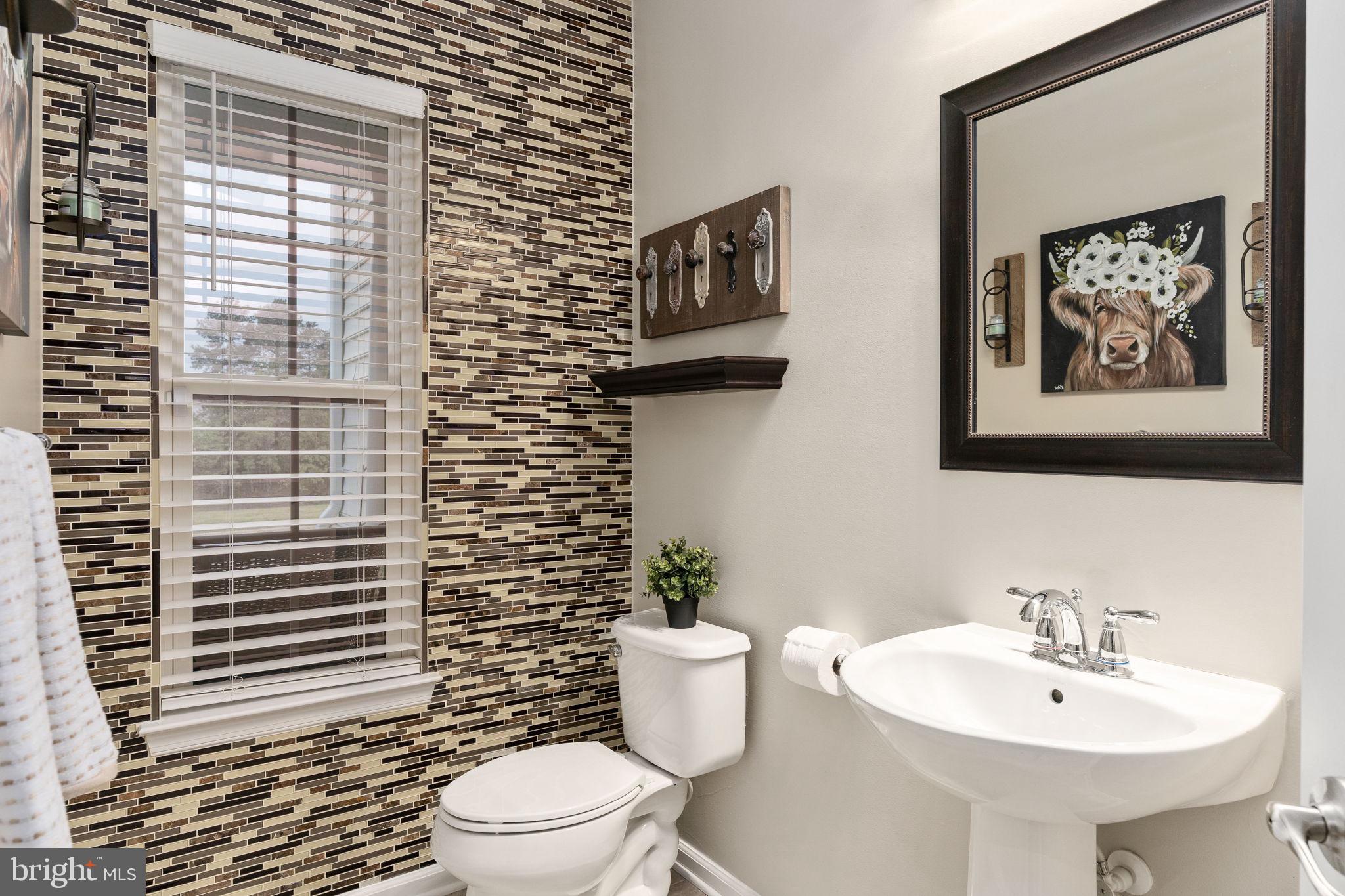 9417 Reservoir Road Fredericksburg, VA 22407 - Photo 34 of 80 Chic bathroom with stylish accents.