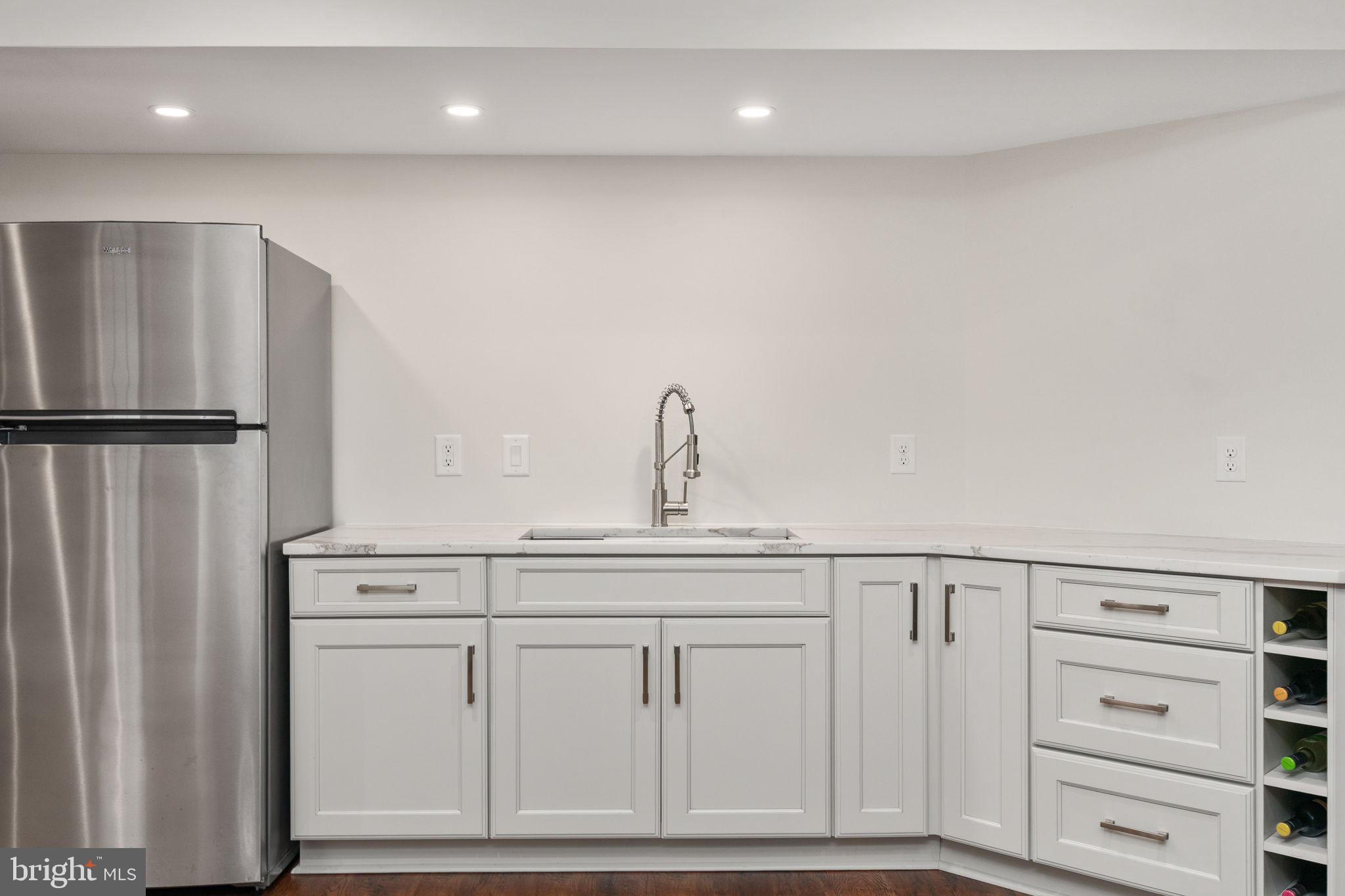 9417 Reservoir Road Fredericksburg, VA 22407 - Photo 40 of 80 Sleek modern kitchen with elegance.
