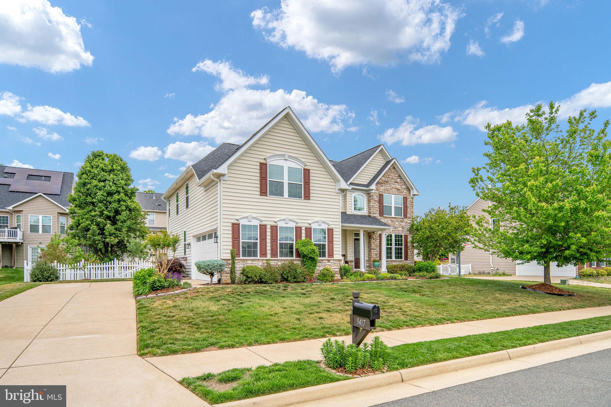 9417 Reservoir Road Fredericksburg, VA 22407 - Photo 6 of 80 Charming home with lush greenery.