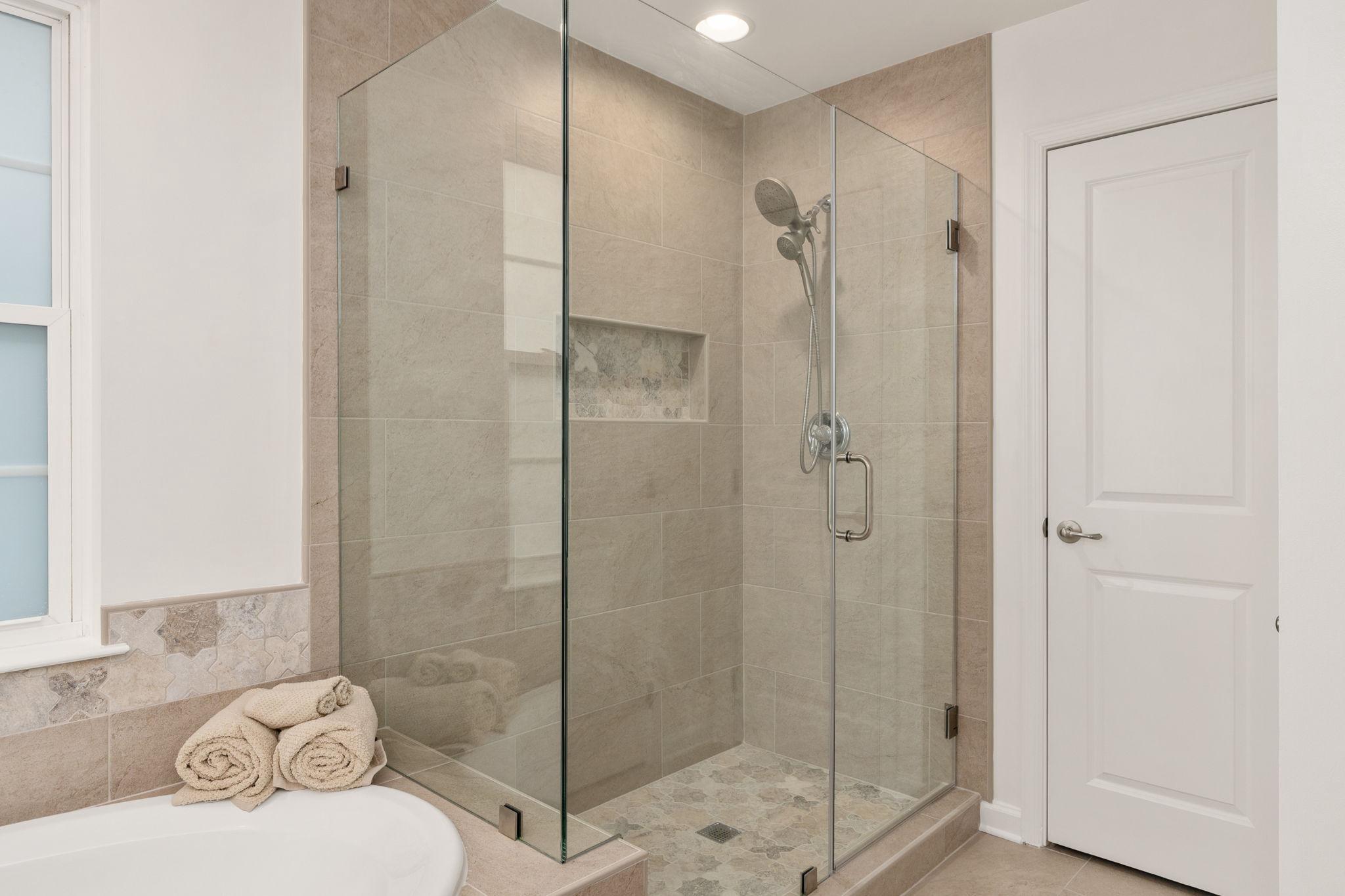 9417 Reservoir Road Fredericksburg, VA 22407 - Photo 63 of 76 a bathroom with a shower toilet and sink