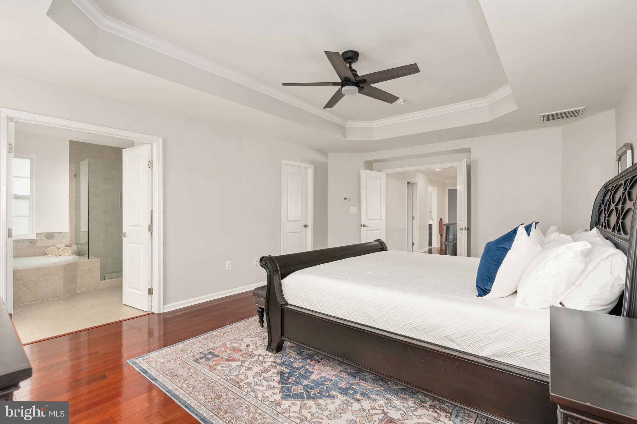 9417 Reservoir Road Fredericksburg, VA 22407 - Photo 65 of 80 Elegant bedroom with modern charm.