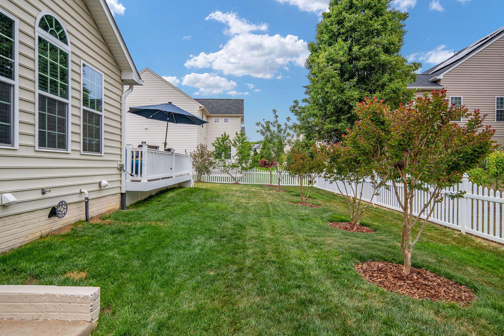9417 Reservoir Road Fredericksburg, VA 22407 - Photo 70 of 76 a view of a house with backyard and a tree