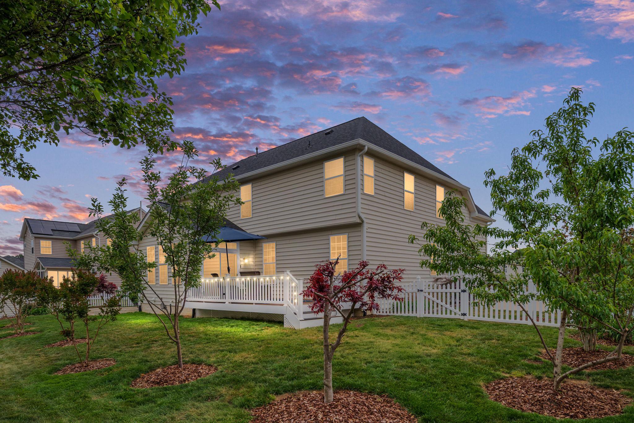 9417 Reservoir Road Fredericksburg, VA 22407 - Photo 75 of 76 a front view of a house with a garden