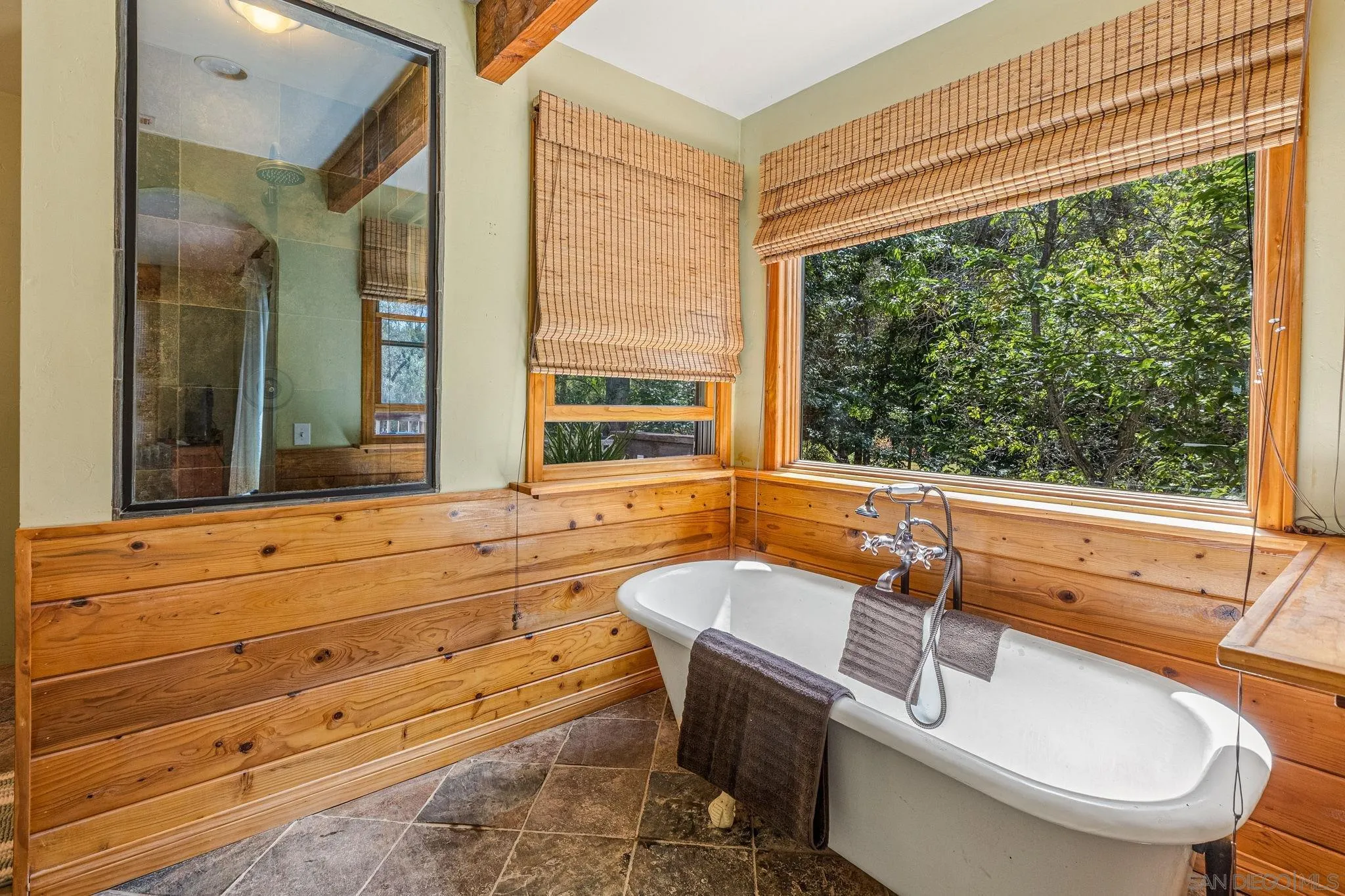 1590 Dorothea Avenue Fallbrook, CA 92028 - Photo 17 of 33 a bathroom with a sink and a large mirror