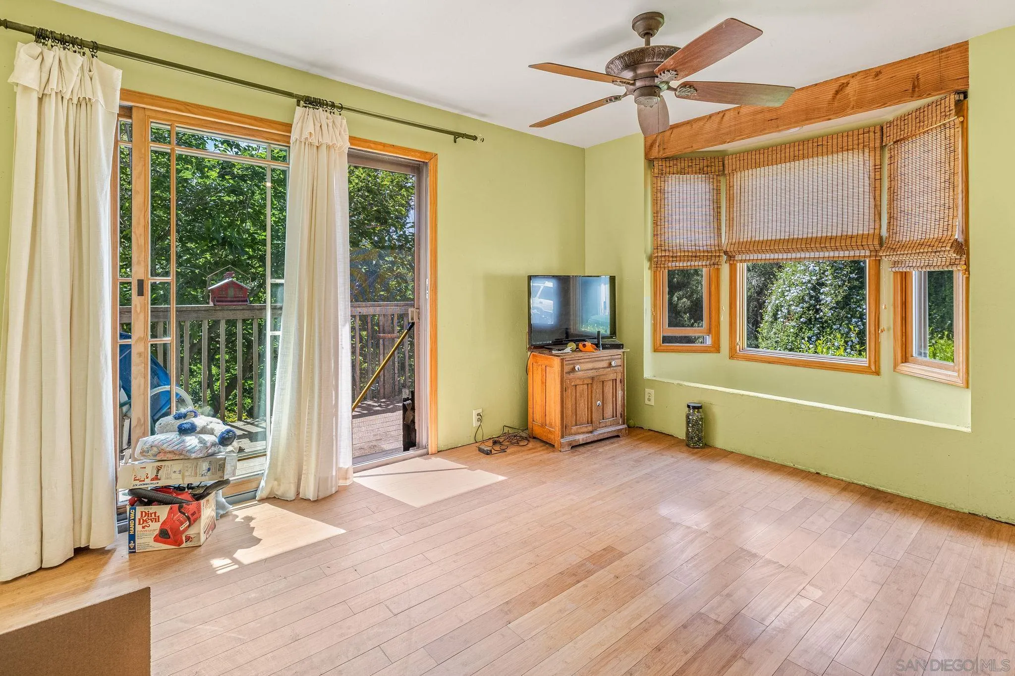 1590 Dorothea Avenue Fallbrook, CA 92028 - Photo 19 of 33 a view of an empty room with a window and a kitchen area