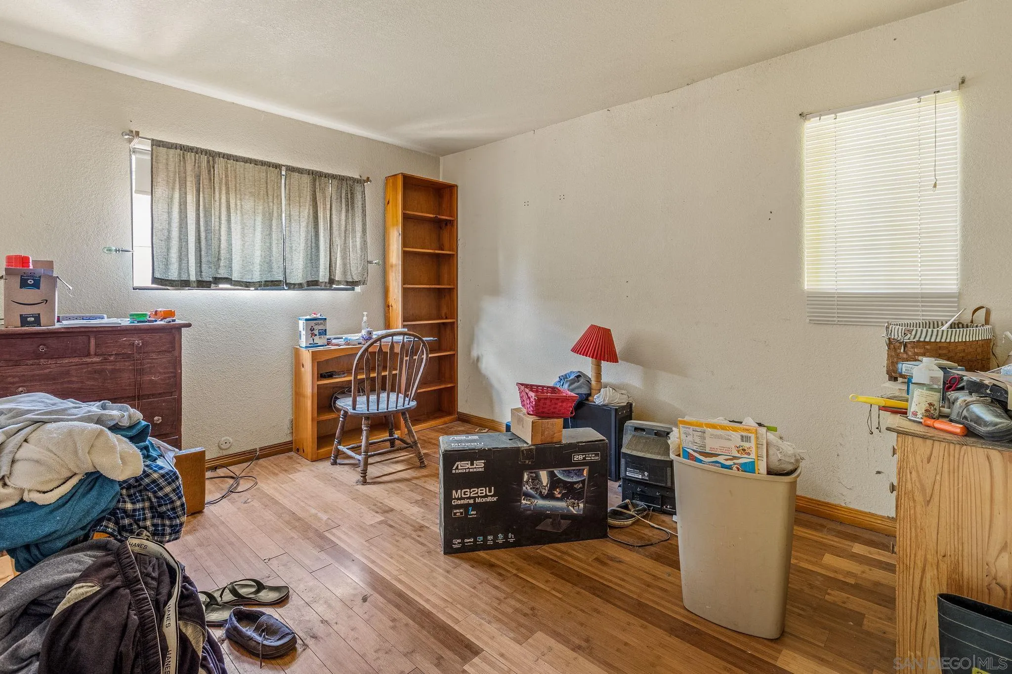 1590 Dorothea Avenue Fallbrook, CA 92028 - Photo 20 of 33 a living room with furniture and a wooden floor