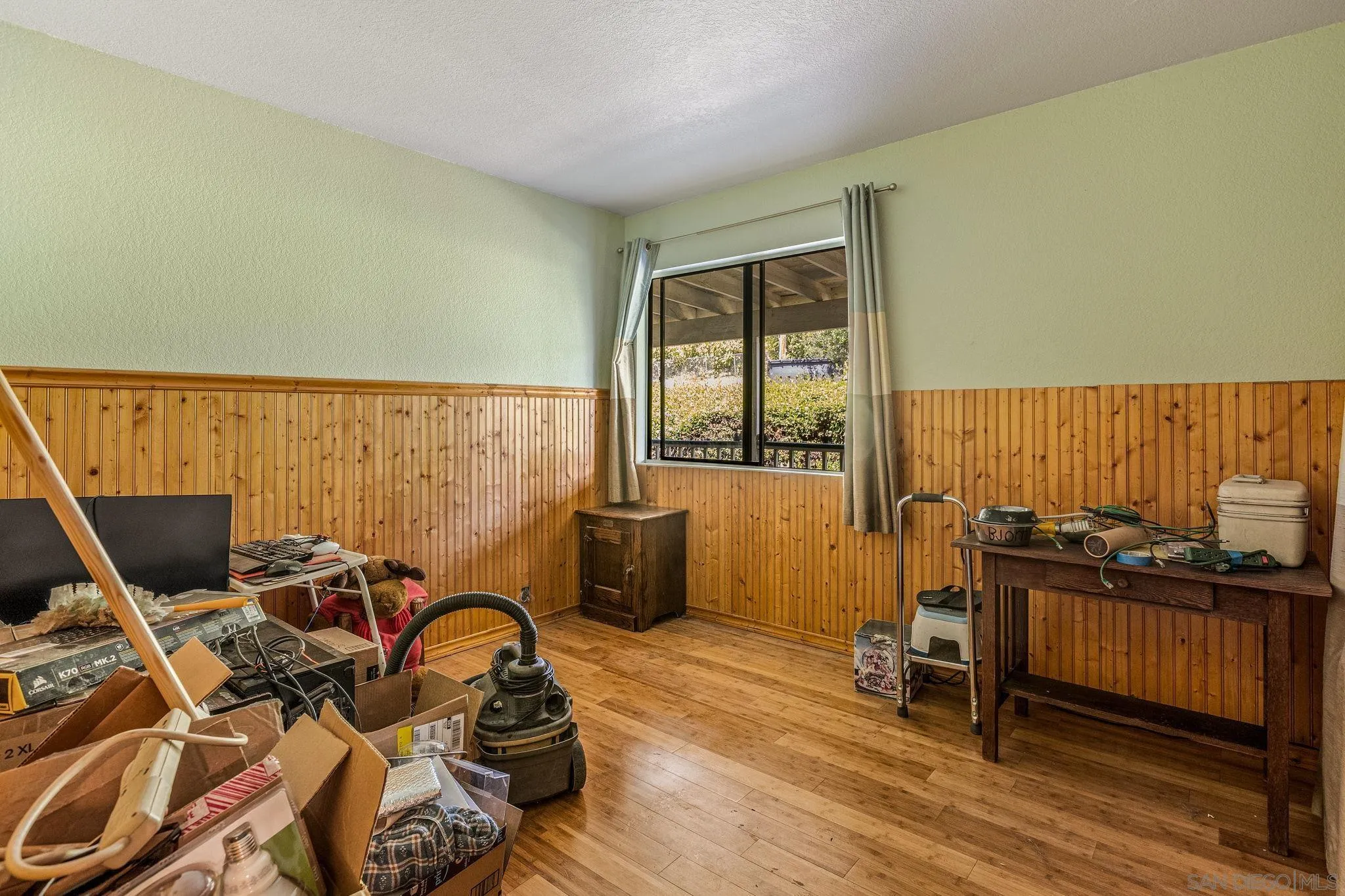 1590 Dorothea Avenue Fallbrook, CA 92028 - Photo 23 of 33 a bedroom with furniture and a window