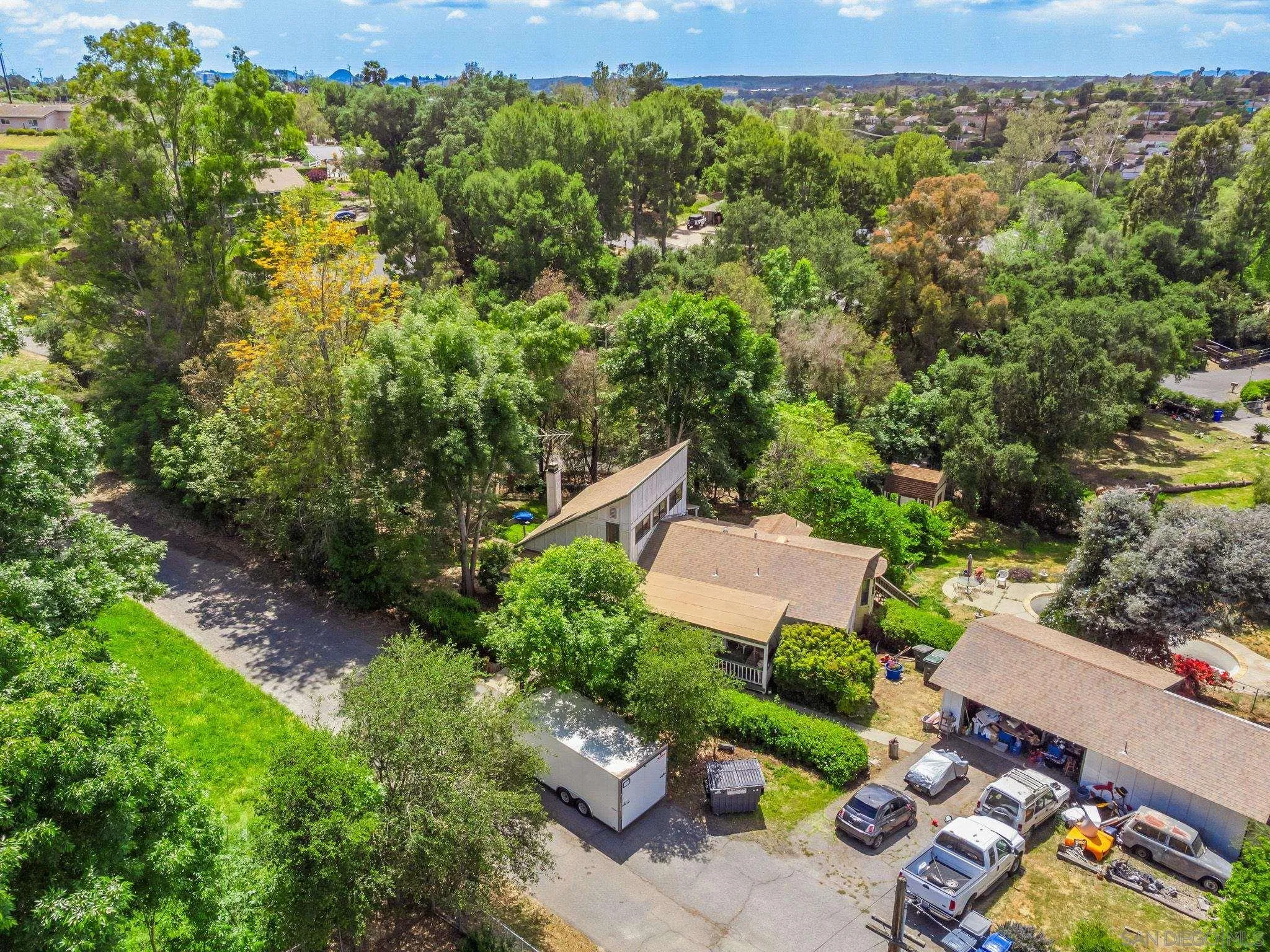 1590 Dorothea Avenue Fallbrook, CA 92028 - Photo 27 of 33 an aerial view of a house with a yard
