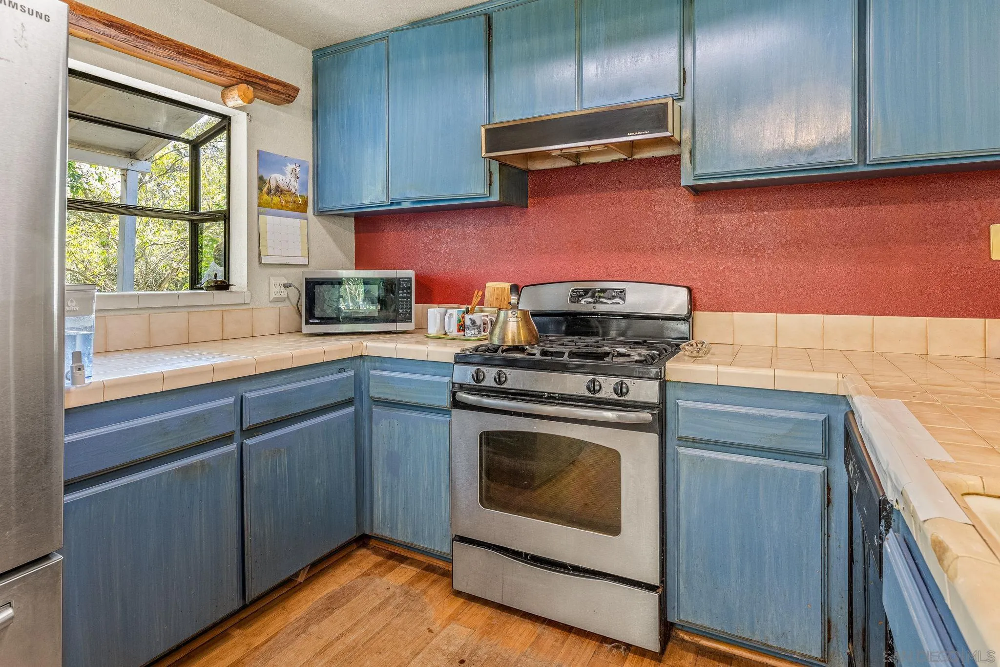 1590 Dorothea Avenue Fallbrook, CA 92028 - Photo 8 of 33 a kitchen with granite countertop cabinets stainless steel appliances and a sink