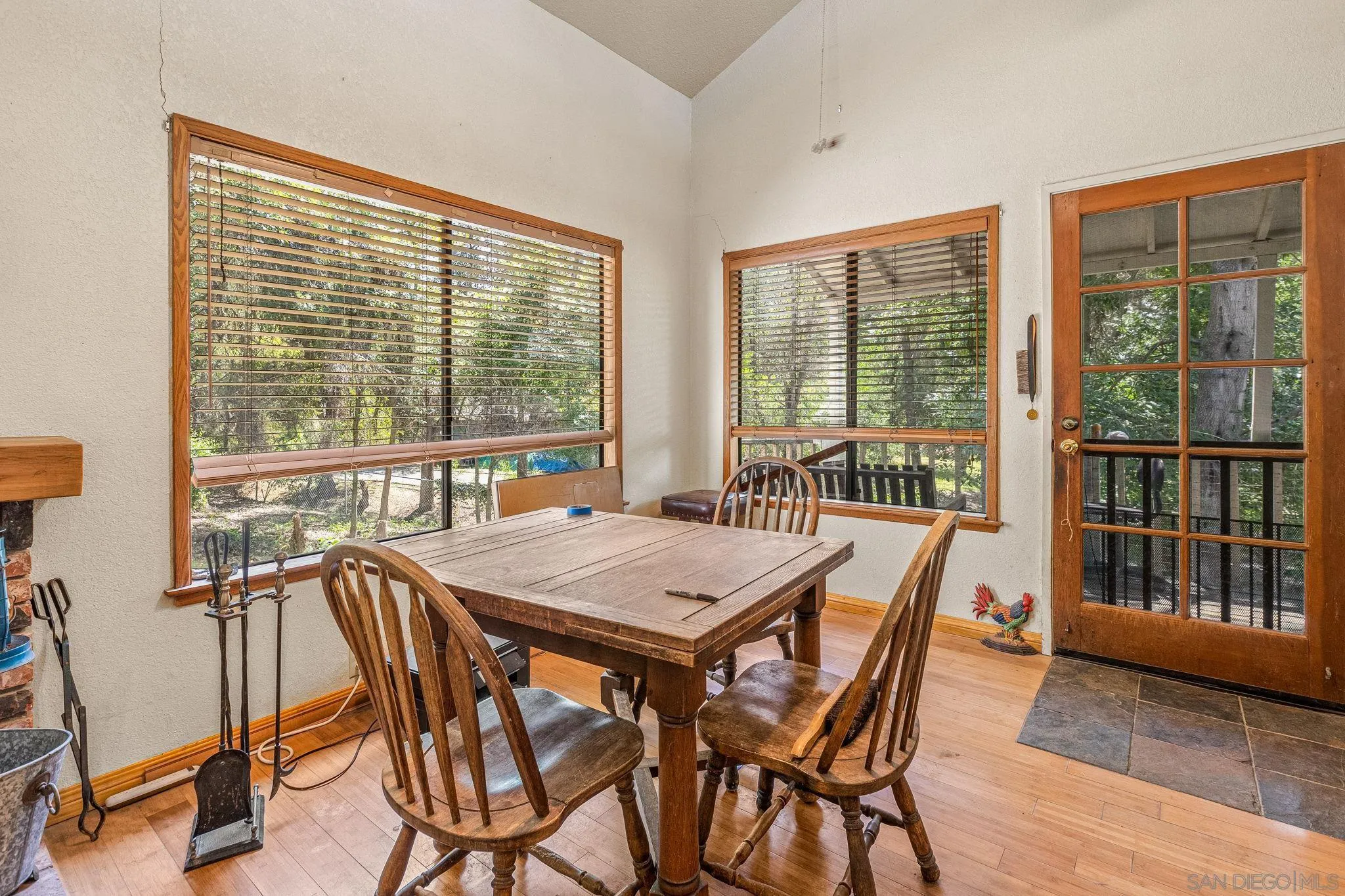1590 Dorothea Avenue Fallbrook, CA 92028 - Photo 9 of 33 a view of a dining room with furniture window and wooden floor