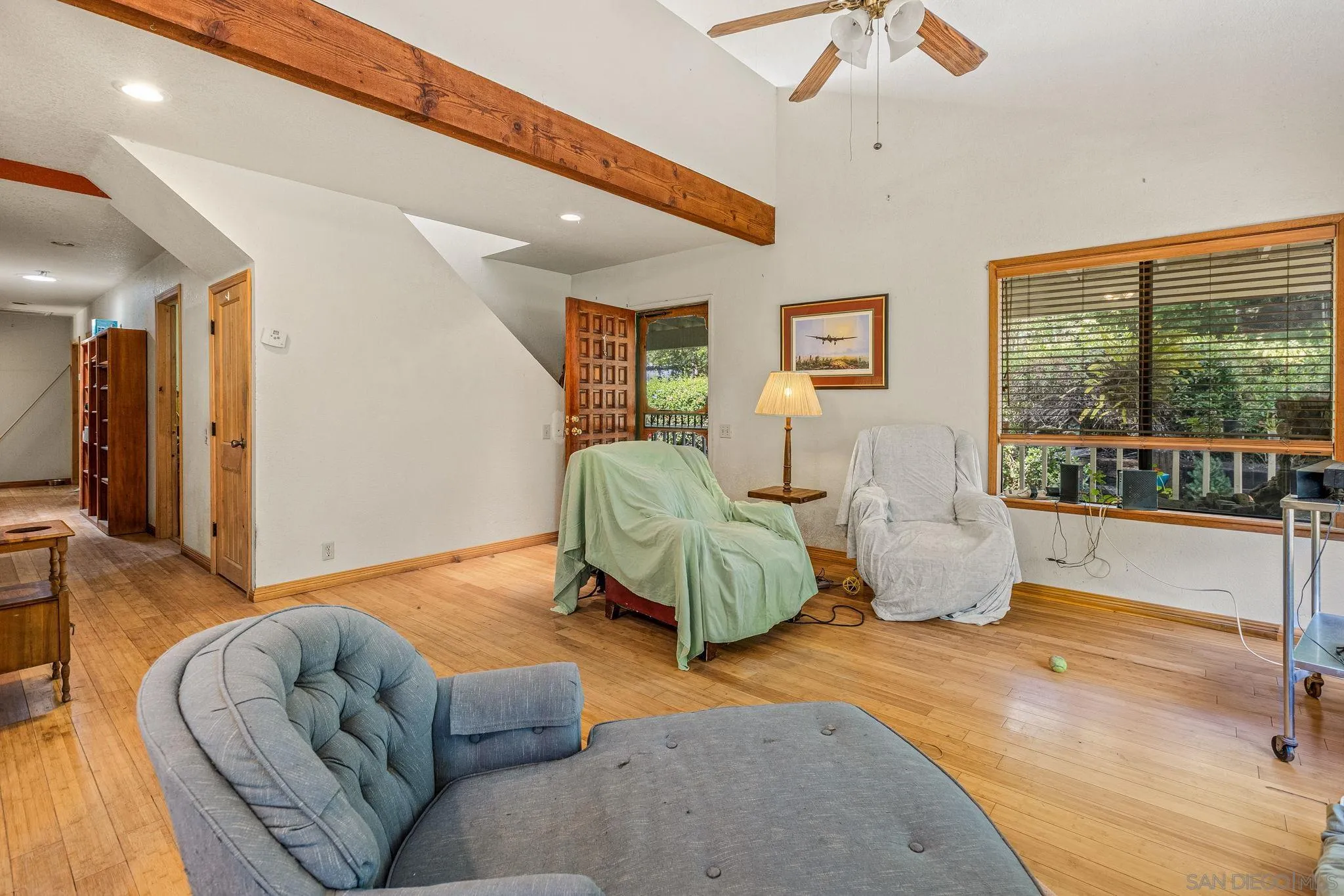 1590 Dorothea Avenue Fallbrook, CA 92028 - Photo 10 of 33 a living room with furniture and a large window