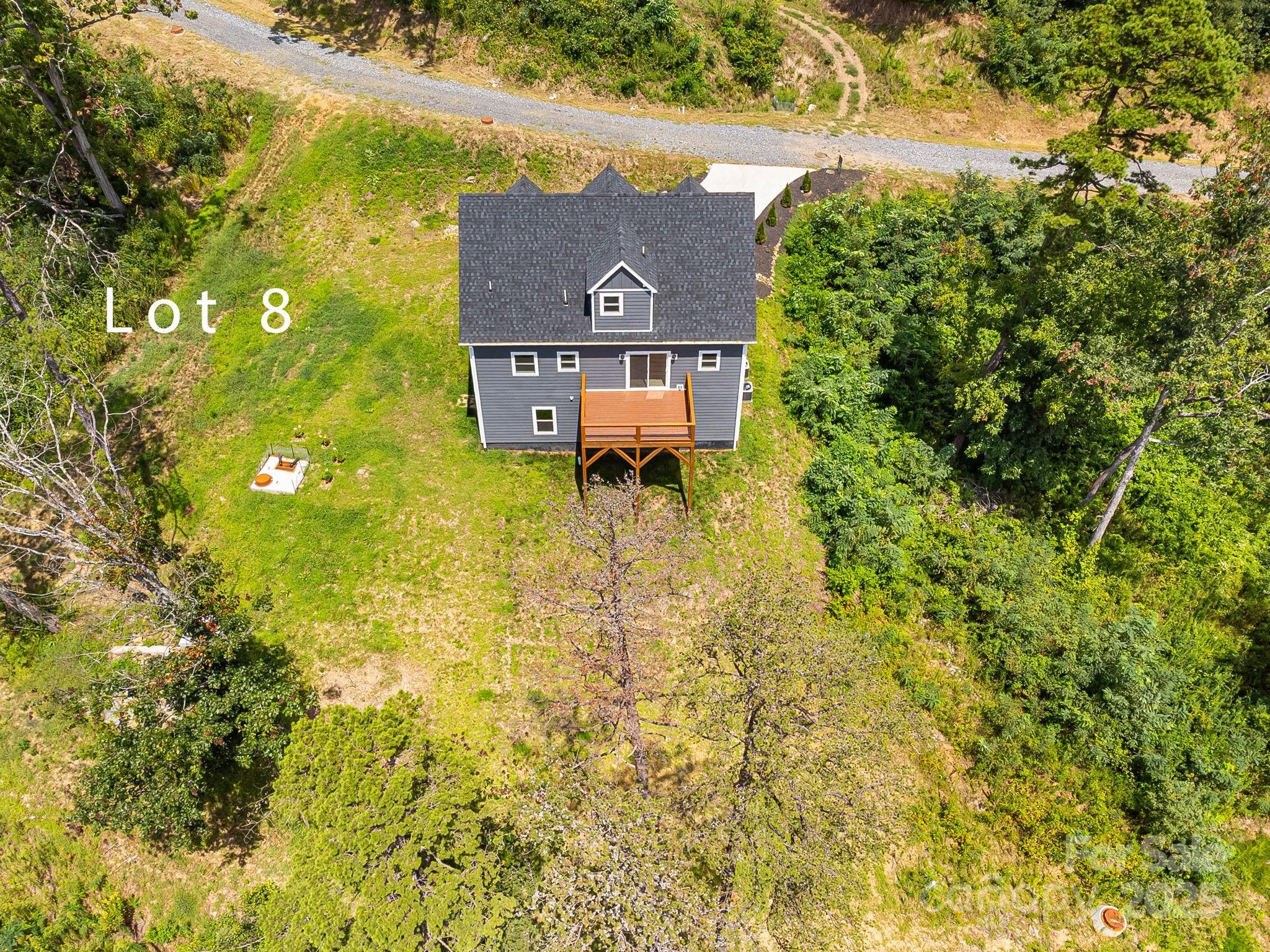 344 Espen Ridge, Unit 8 Asheville, NC 28804 - Photo 8 of 13 a aerial view of a house with a yard