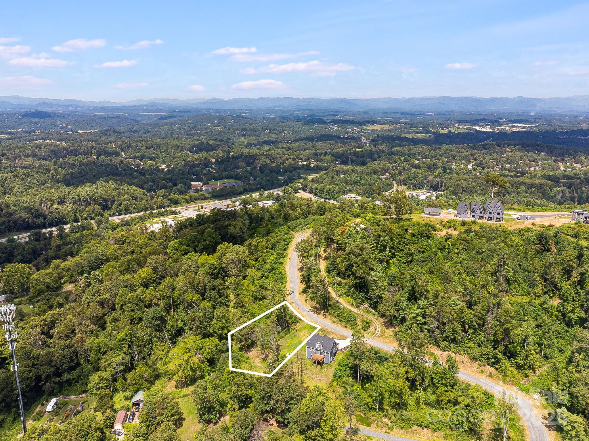344 Espen Ridge, Unit 8 Asheville, NC 28804 - Photo 10 of 13 a view of a city with mountains in the background
