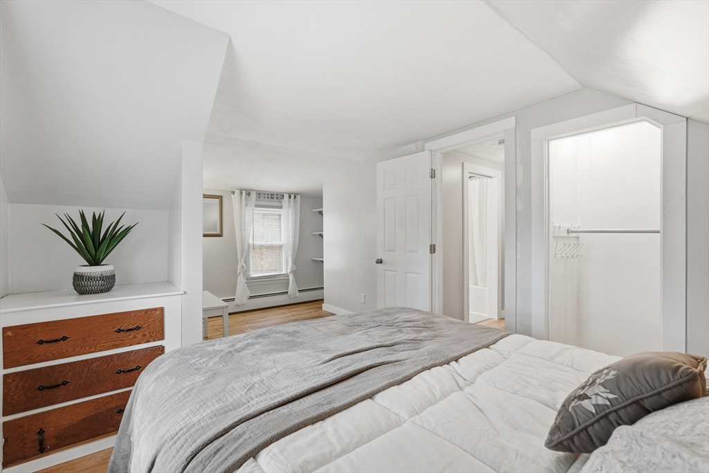 180 Wolcott Avenue West Springfield, MA 01089 - Photo 21 of 39 a bedroom with a bed and a dresser