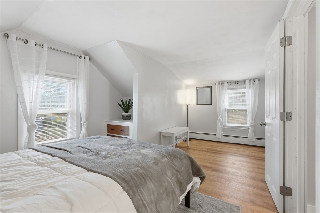 180 Wolcott Avenue West Springfield, MA 01089 - Photo 22 of 39 a bedroom with a large bed and a window