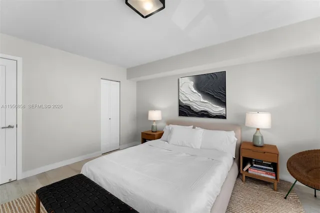 a bathroom with a sink a mirror and shower