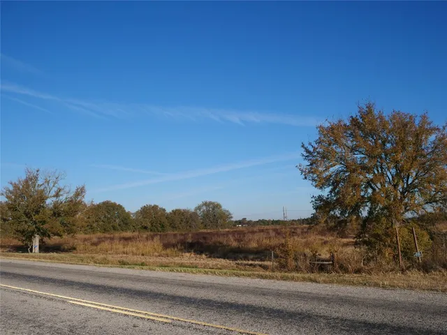 a view of a yard and mountain view