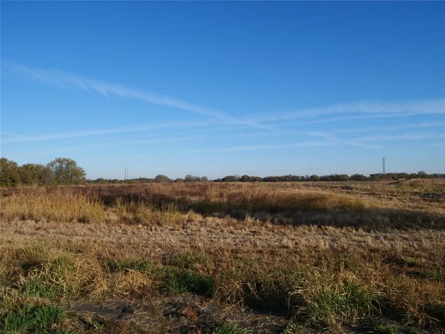 a view of an outdoor space and covered with trees