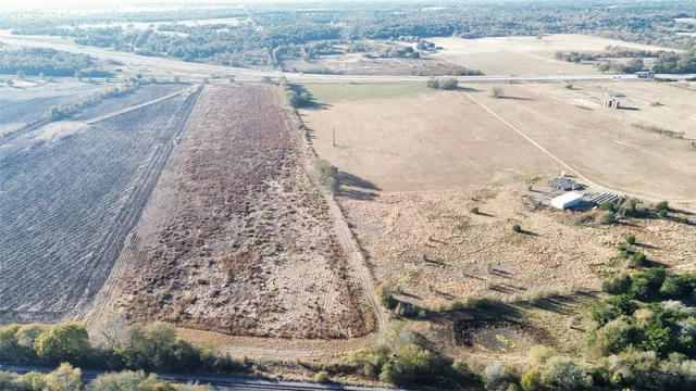 a view of a lake with beach