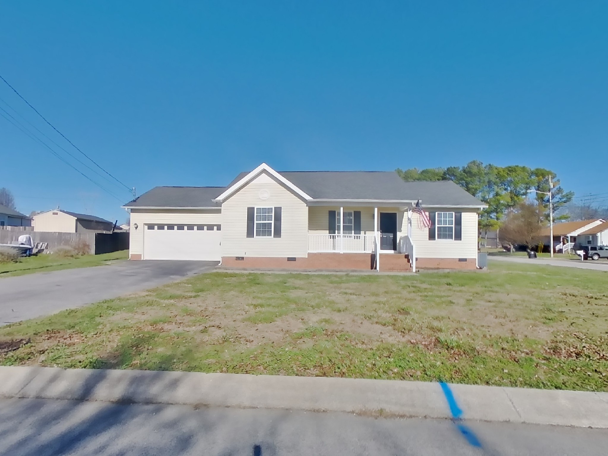 1612 Robert Road Columbia, TN 38401 - Photo 1 of 15 a view of a white house with a yard and garage