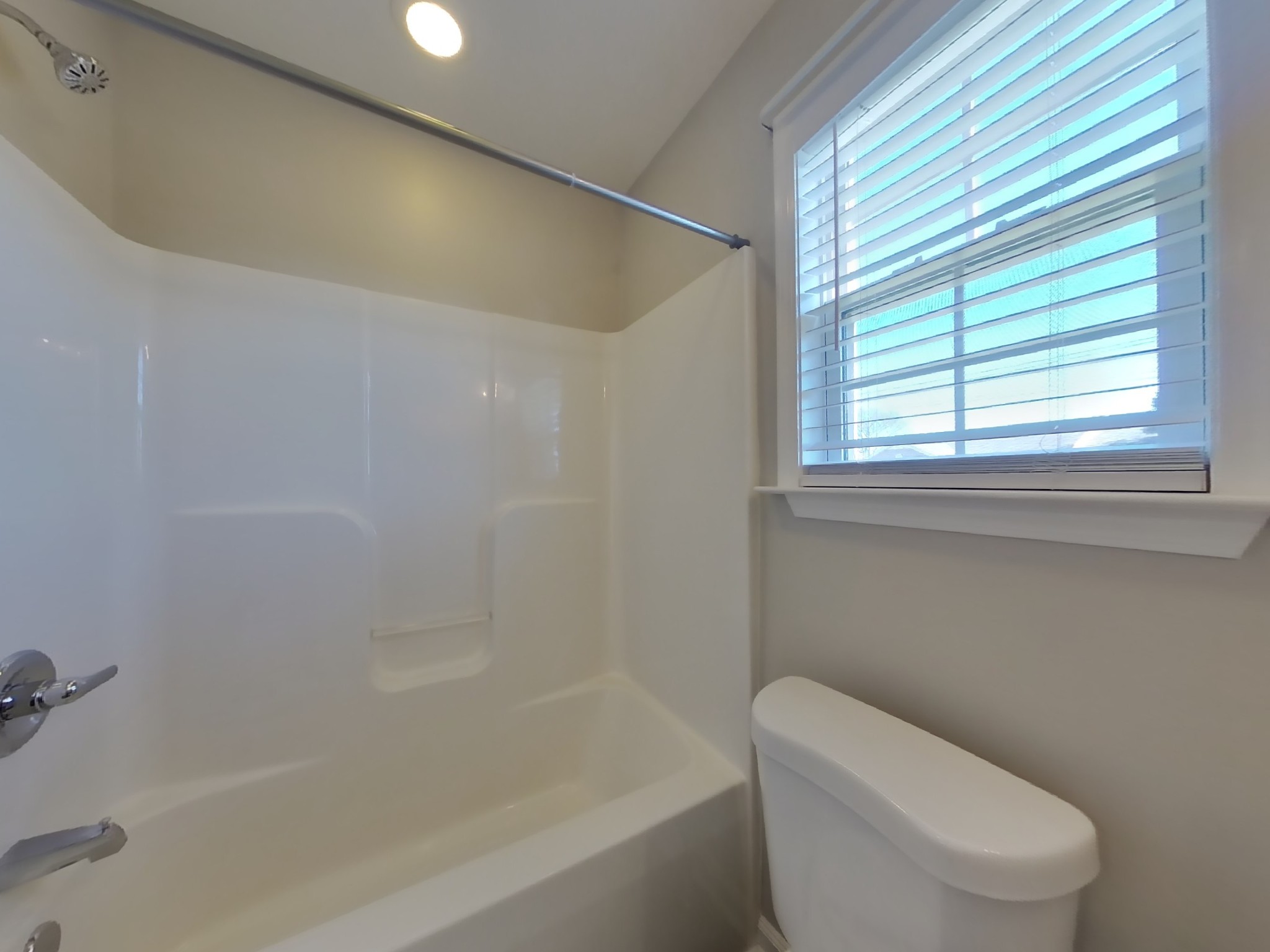 1612 Robert Road Columbia, TN 38401 - Photo 14 of 15 a white toilet sitting next to a bath tub