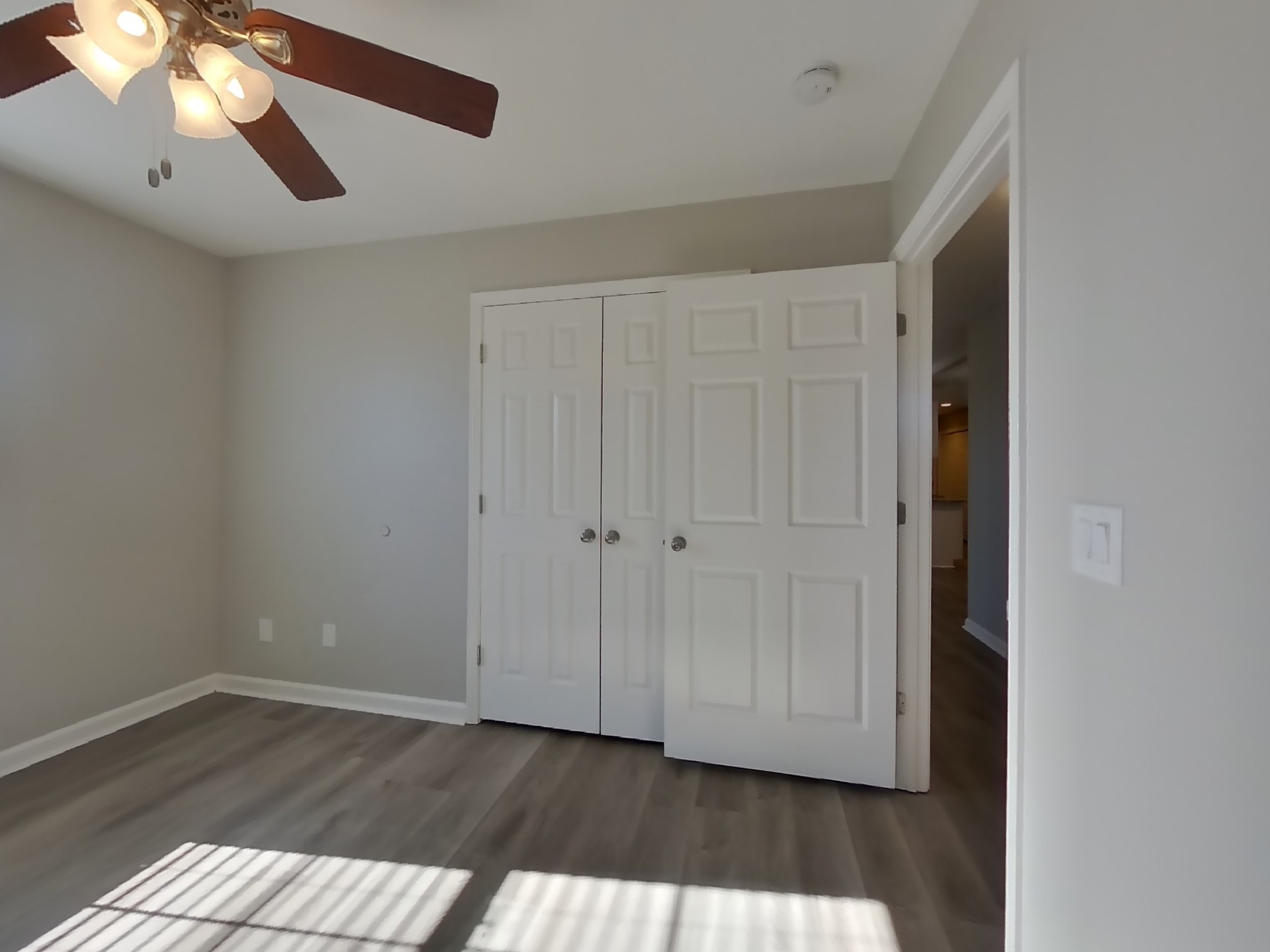 1612 Robert Road Columbia, TN 38401 - Photo 10 of 15 a view of an empty room with wooden floor