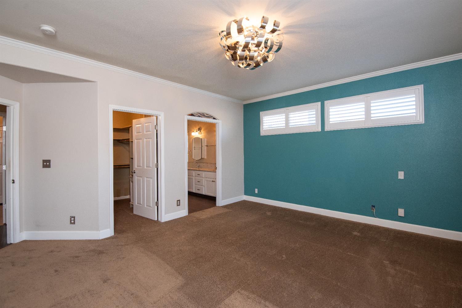 3601 Chant Drive Modesto, CA 95355 - Photo 11 of 23 an empty room with windows and closet