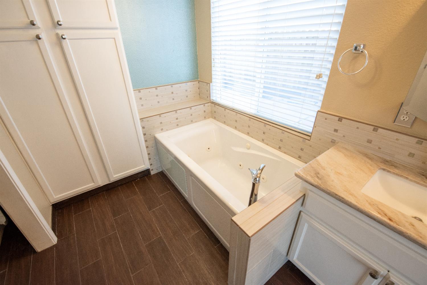 3601 Chant Drive Modesto, CA 95355 - Photo 13 of 23 a bathroom with a bathtub and a sink