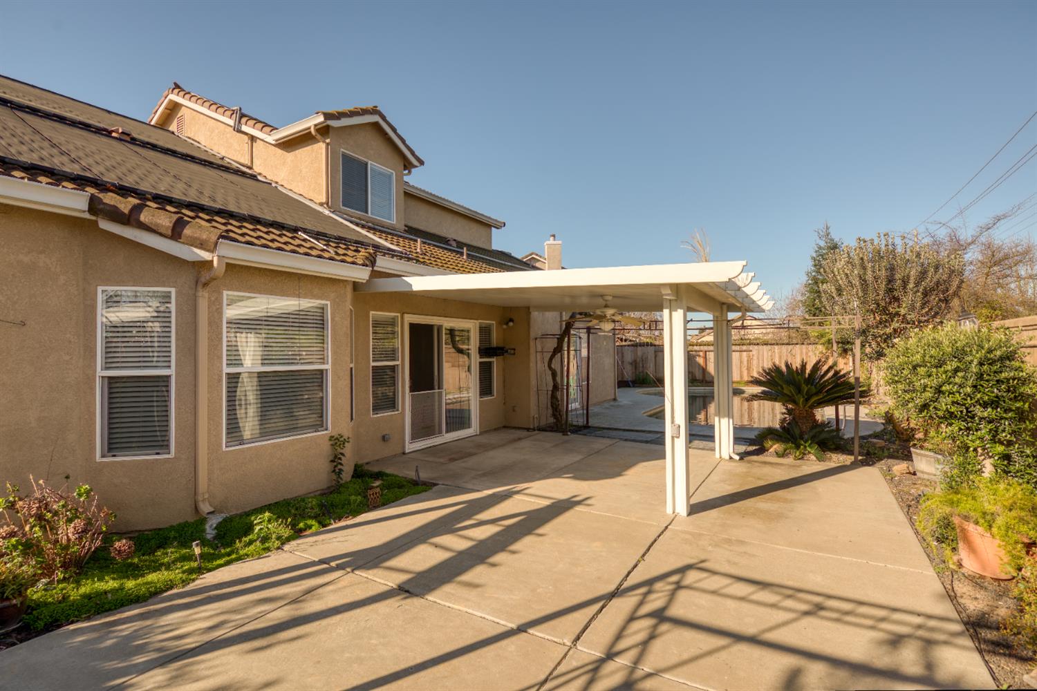 3601 Chant Drive Modesto, CA 95355 - Photo 19 of 23 a front view of a house with a garden