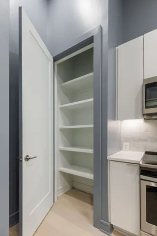 a view of an empty room and window